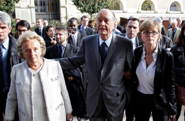 Former French President Jacques Chirac (C) walks between his wife Bernadette (L) and daughter Claude (R) as they leave the Musee du Quai Branly after an awards ceremony for the Prix de la Fondation Chirac in Paris on Nov. 5, 2010. (John Schults/File Photo via Reuters)
