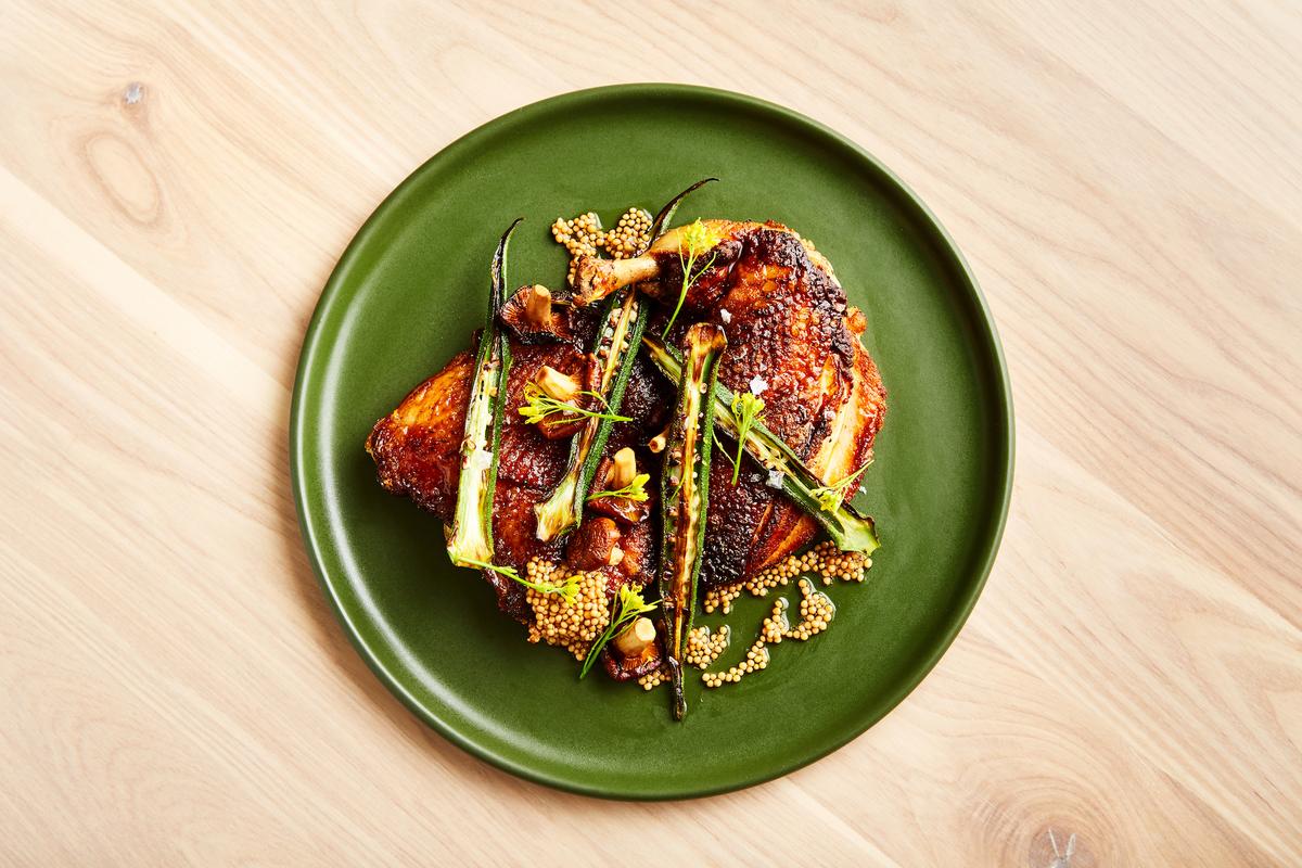 The heritage chicken with foraged mushrooms, red okra, and mustard seeds. (Courtesy of Il Fiorista)