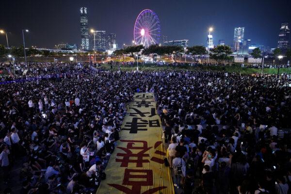 Anti-government protesters attend a rally at Edinburgh Place to show solidarity for arrested political activists being held at San Uk Ling detention center in Hong Kong, China September 27, 2019. (Athit Perawongmetha/Reuters)