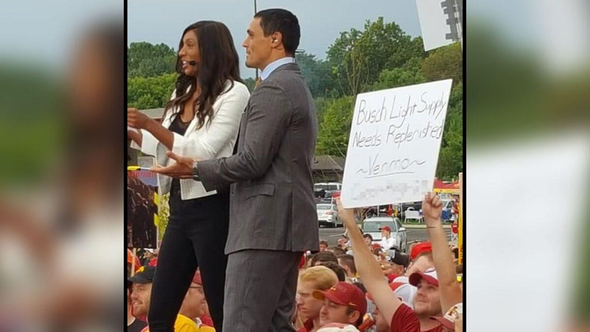 Iowa State fan Carson King holds up a sign asking for beer money at the ESPN "College GameDay" set on Sept. 14, in Ames, Iowa. (Courtesy of John Recker)