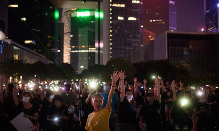 Activists Slam Hong Kong Police Warning of National Day Violence