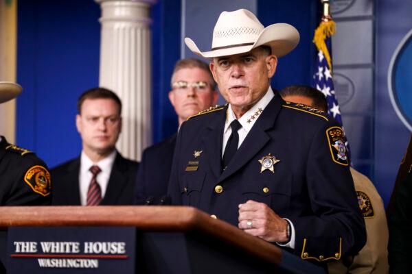 Sheriff Jim Skinner of Collin County, Texas, speaks to media with Acting ICE Director Matthew Albence (not pictured) and other law enforcement officials at a press briefing in the White House in Washington on Sept. 26, 2019. (Charlotte Cuthbertson/The Epoch Times)
