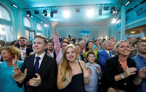 Supporters of Austrian Peoples Party (OeVP) Sebastian Kurz react after the close of the polling stations in Vienna, Austria, on Sept. 29, 2019. (Leonhard Foeger/Reuters)