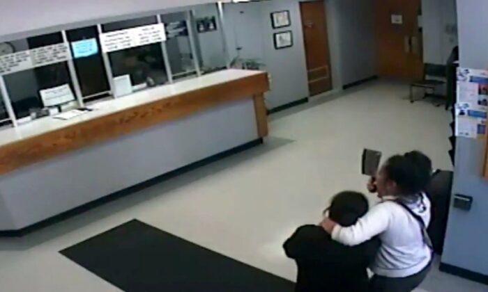 Video Shows Moment Cleaver-Wielding Woman Takes Hostage Inside Police Station