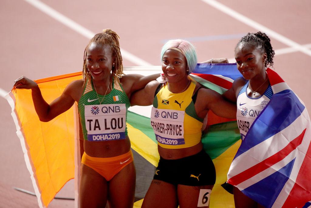 Fraser-Pryce takes gold, Asher-Smith takes silver, and Ta Lou takes bronze after the Women's 100 Meters final of the 17th IAAF World Athletics Championships in Doha, Qatar. (©Getty Images | <a href="https://www.gettyimages.com.au/detail/news-photo/shelly-ann-fraser-pryce-of-jamaica-gold-dina-asher-smith-of-news-photo/1177920774">Christian Petersen</a>)