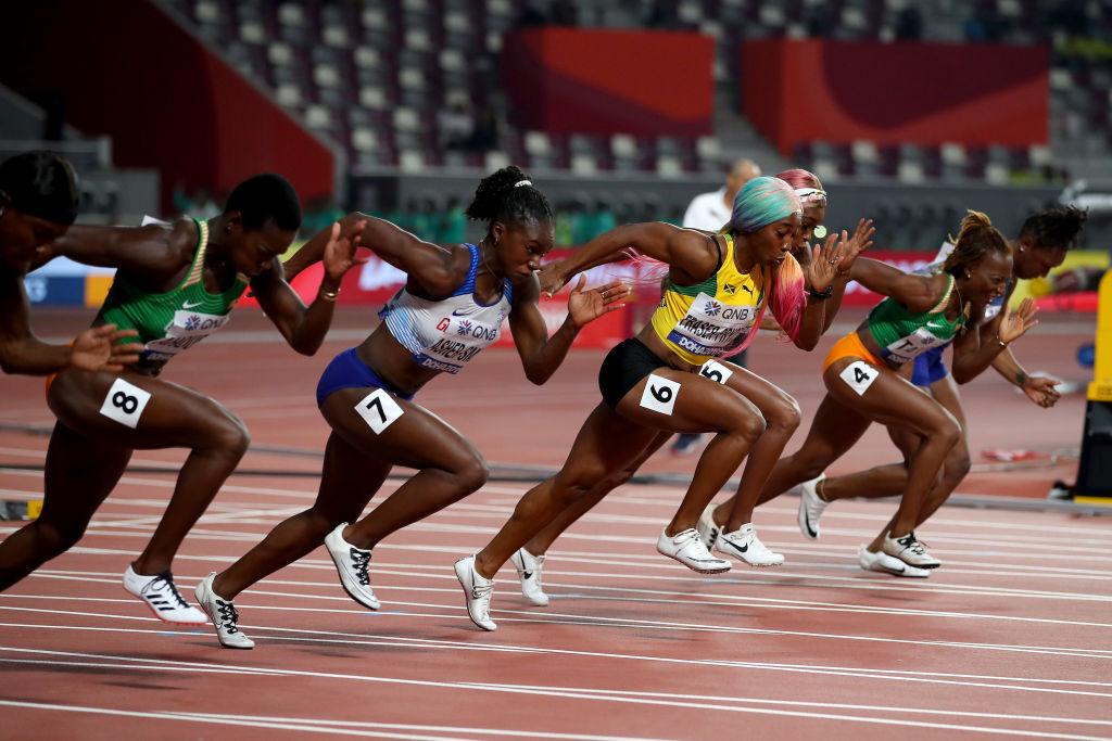 Fraser-Pryce, Asher-Smith, and Ta Lou competing in the Women's 100 Meters final at Khalifa International Stadium on Sept. 29, 2019 (©Getty Images | <a href="https://www.gettyimages.com.au/detail/news-photo/shelly-ann-fraser-pryce-of-jamaica-gold-dina-asher-smith-of-news-photo/1177923951">Richard Heathcote</a>)