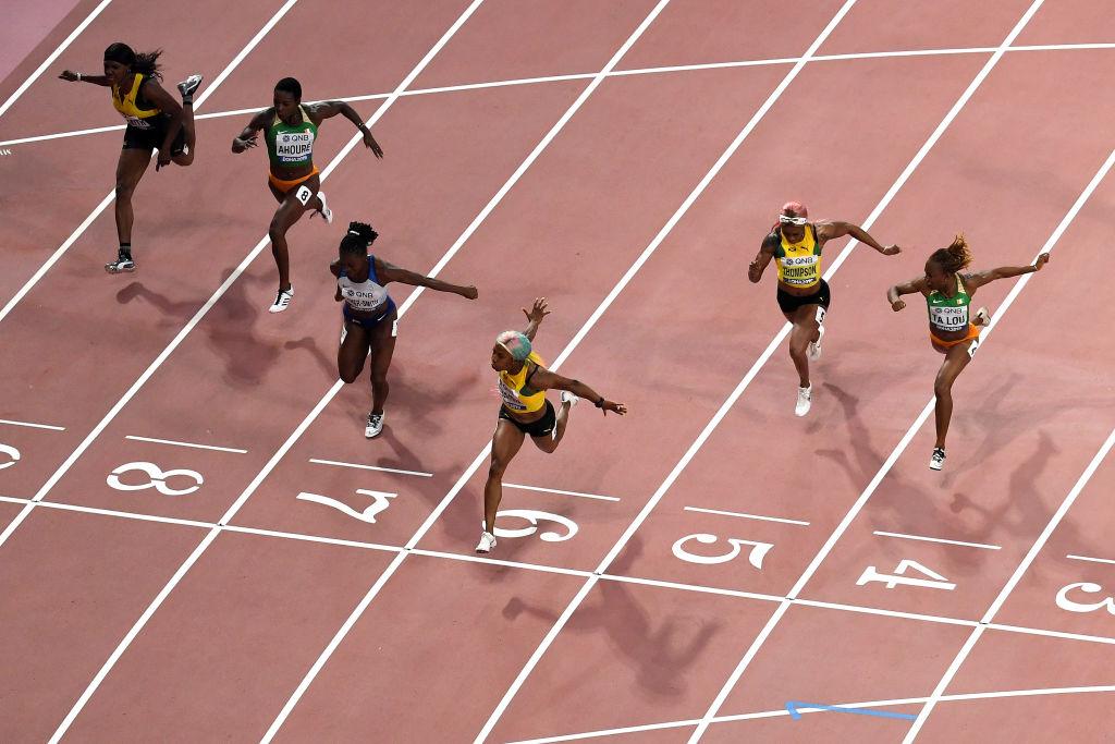 Fraser-Pryce crosses the finish line to win the Women's 100 Meters final ahead of Asher-Smith and Ta Lou. (©Getty Images | <a href="https://www.gettyimages.com.au/detail/news-photo/shelly-ann-fraser-pryce-of-jamaica-crosses-the-finish-line-news-photo/1177923974">Matthias Hangst</a>)