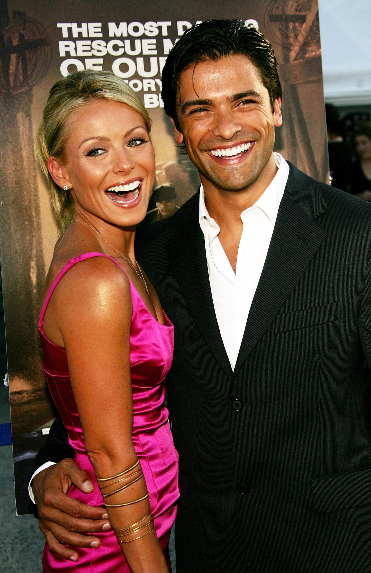 Ripa and Consuelos at a screening of Miramax's "The Great Raid" at The Intrepid Sea, Air & Space Museum in New York City in 2005 (©Getty Images | <a href="https://www.gettyimages.com.au/detail/news-photo/actor-mark-consuelos-and-wife-actress-kelly-ripa-attend-a-news-photo/53351306">Evan Agostini</a>)