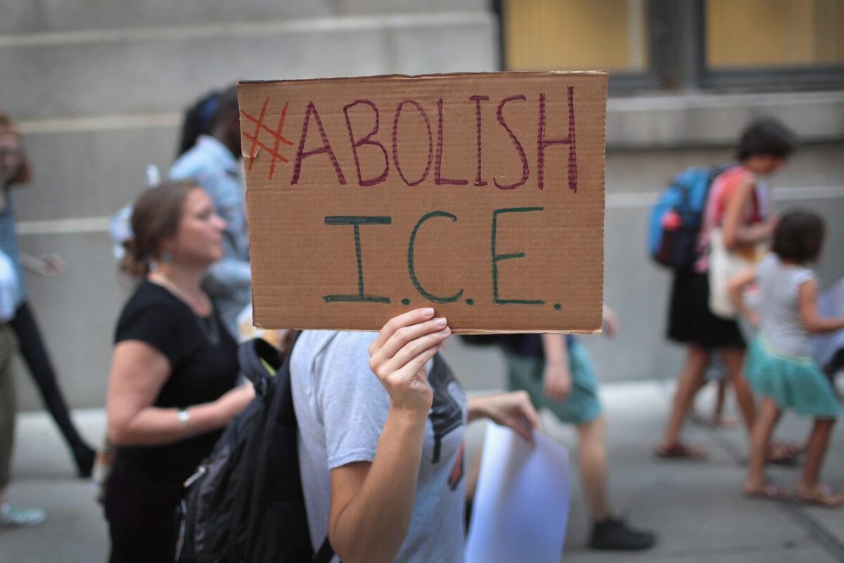 Demonstrators march through downtown Chicago calling for the abolition of U.S. Immigration and Customs Enforcement on Aug. 16, 2018. (Scott Olson/Getty Images)