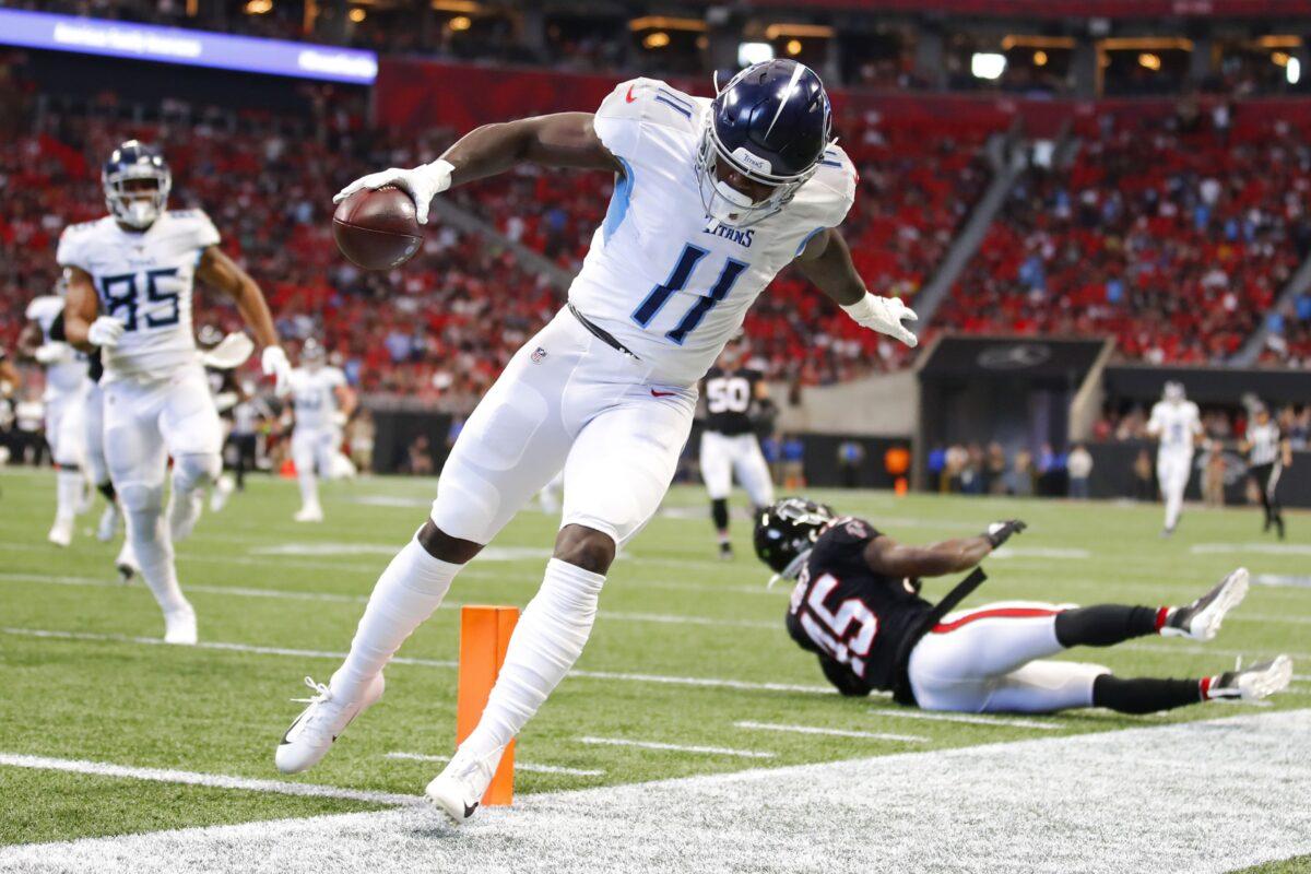 A.J. Brown #11 of the Tennessee Titans rushes in for a touchdown after the reception in the first half of an NFL game against the Atlanta Falcons at Mercedes-Benz Stadium in Atlanta, Georgia, on Sept. 29, 2019. (Todd Kirkland/Getty Images)