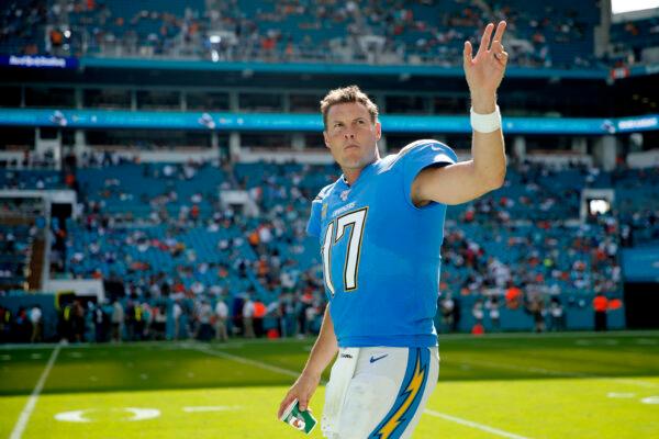 Philip Rivers #17 of the Los Angeles Chargers waves to the crowd against the Miami Dolphins during the fourth quarter at Hard Rock Stadium on September 29, 2019 in Miami, Florida. (Photo by Michael Reaves/Getty Images)