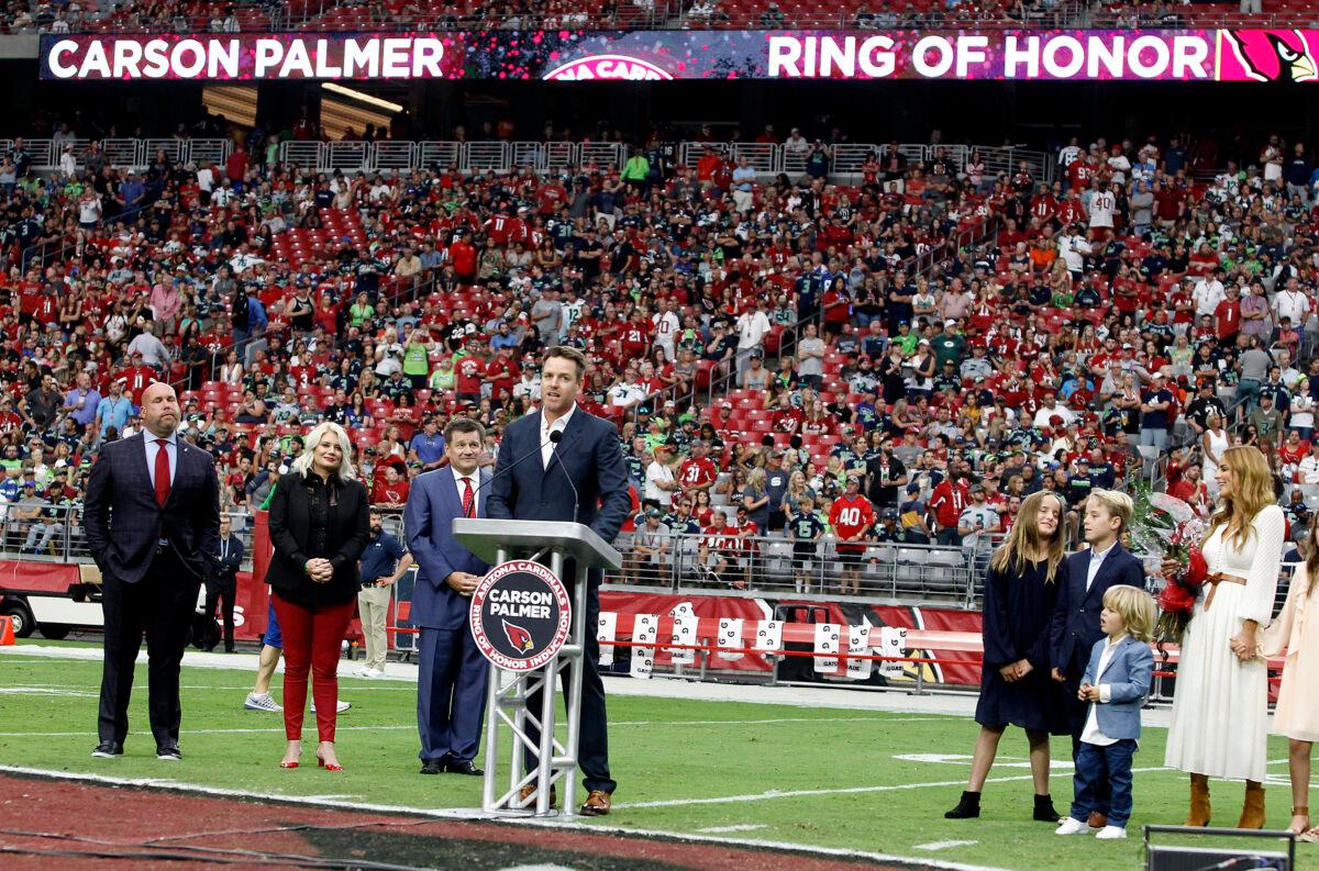Former Arizona Cardinals quarterback Carson Palmer speaks during his induction into the team's Ring of Honor during halftime of the NFL football game between the Arizona Cardinals and Seattle Seahawks at State Farm Stadium on September 29, 2019 in Glendale, Arizona. (Photo by Ralph Freso/Getty Images)