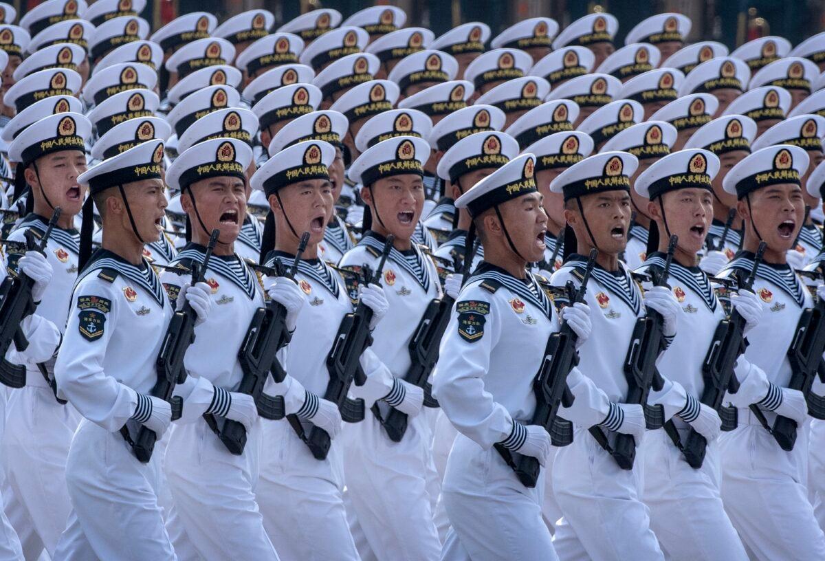 Chinese navy sailors march in formation during a parade to celebrate the 70th anniversary of the founding of the Chinese communist regime at Tiananmen Square in 1949 in Beijing, China, on Oct. 1, 2019. (Kevin Frayer/Getty Images)