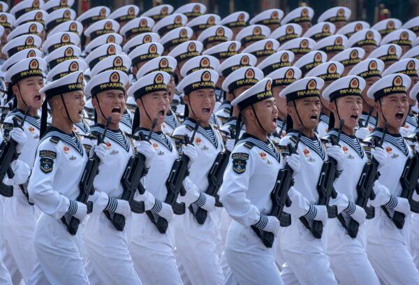 Chinese navy sailors march in formation during a parade to celebrate the 70th anniversary of the founding of the People's Republic of China at Tiananmen Square in 1949 in Beijing, China, on Oct. 1, 2019. (Kevin Frayer/Getty Images)