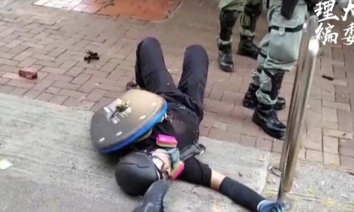 Young Protester Shot With Live Round in Hong Kong During Unrest on Chinese Regime’s 70th Founding Anniversary