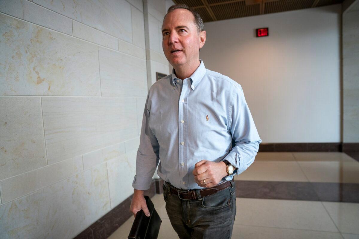 House Intelligence Committee Chairman Adam Schiff (D-Calif.) walks to a secure facility in the Capitol in Washington to prepare for depositions in the impeachment inquiry of President Donald Trump on Oct. 1, 2019. (AP Photo/J. Scott Applewhite)