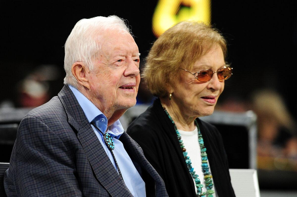 Former President Jimmy Carter and his wife, Rosalynn, before a game between the Atlanta Falcons and the Cincinnati Bengals at Mercedes-Benz Stadium in Atlanta on Sept. 30, 2018. (Scott Cunningham/Getty Images)