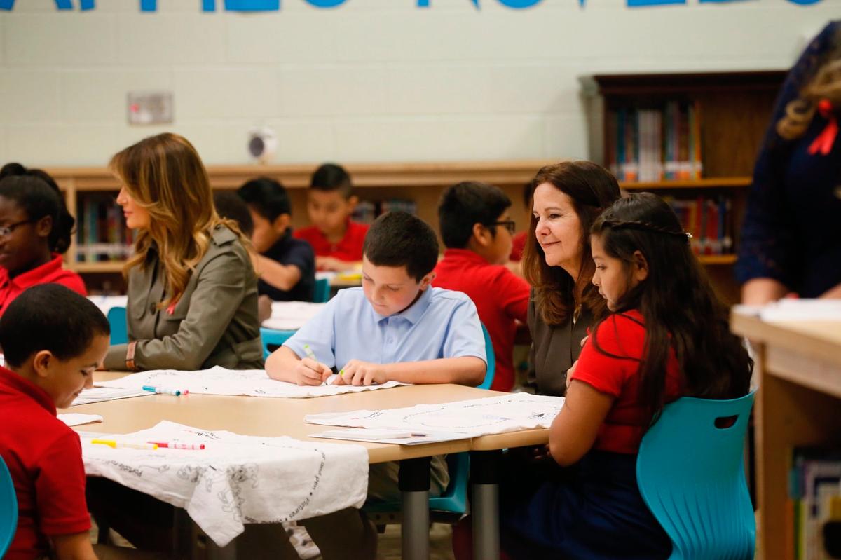 First lady Melania Trump, left, and Karen Pence, right, visit students at Lambs Elementary in North Charleston, S.C. on Oct. 30, 2019. (Grace Beahm Alford/The Post And Courier via AP)