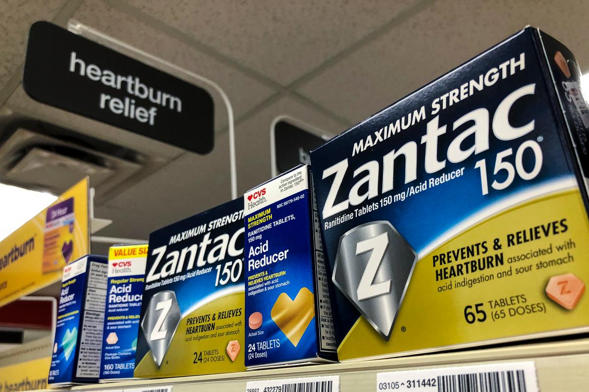 Packages of Zantac, a popular medication which decreases stomach acid production and prevents heartburn, sit on a shelf at a drugstore in New York City on Sept. 19, 2019. (Photo by Drew Angerer/Getty Images)