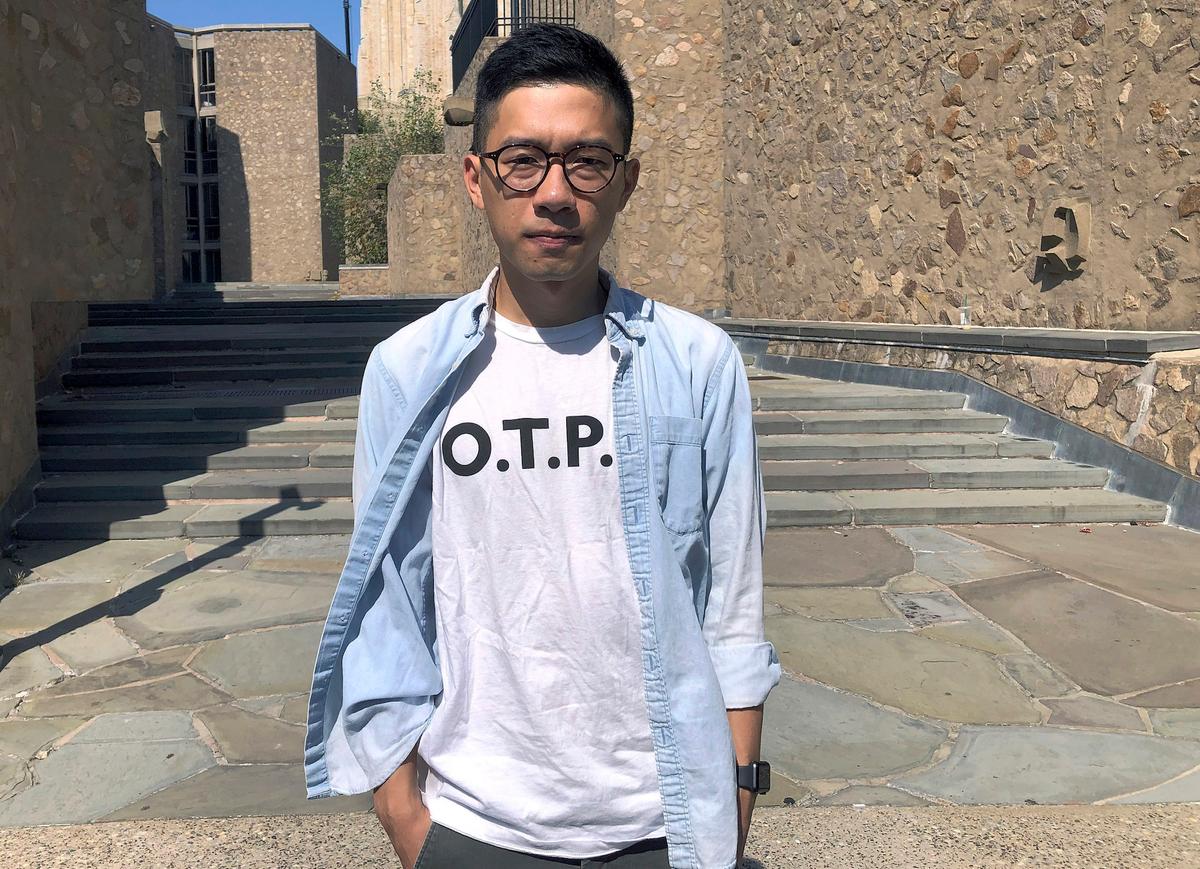 Nathan Law, a leading Hong Kong democracy advocate and current graduate student at Yale, poses on the school campus in New Haven, Conn., U.S. on Sept. 23, 2019. (Michael Melia/AP)