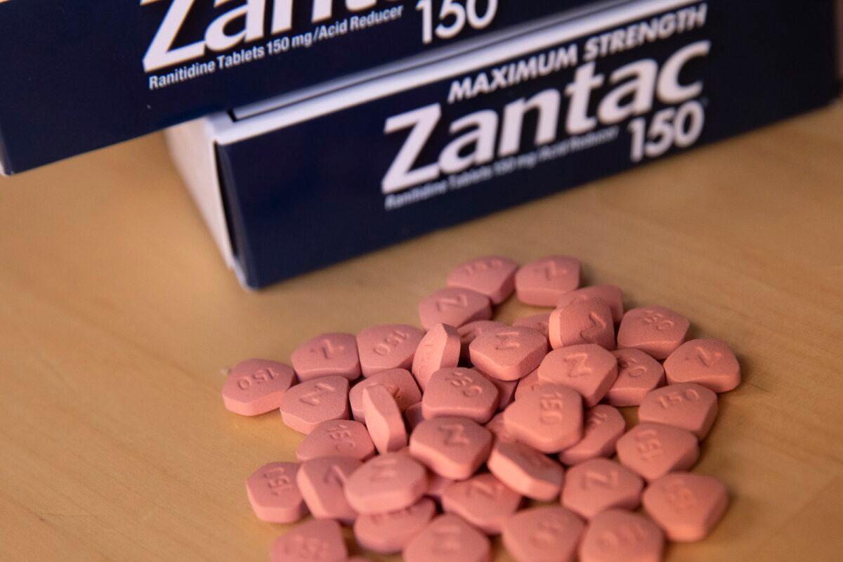 Zantac packages and pills in a photo illustration. (Drew Angerer/Getty Images)