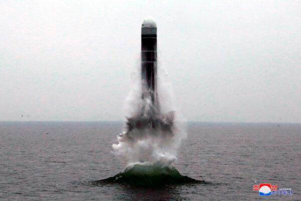 An underwater-launched missile lifts off in the waters off North Korea's eastern coastal town of Wonsan on Oct. 2, 2019. (Korean Central News Agency/Korea News Service via AP)