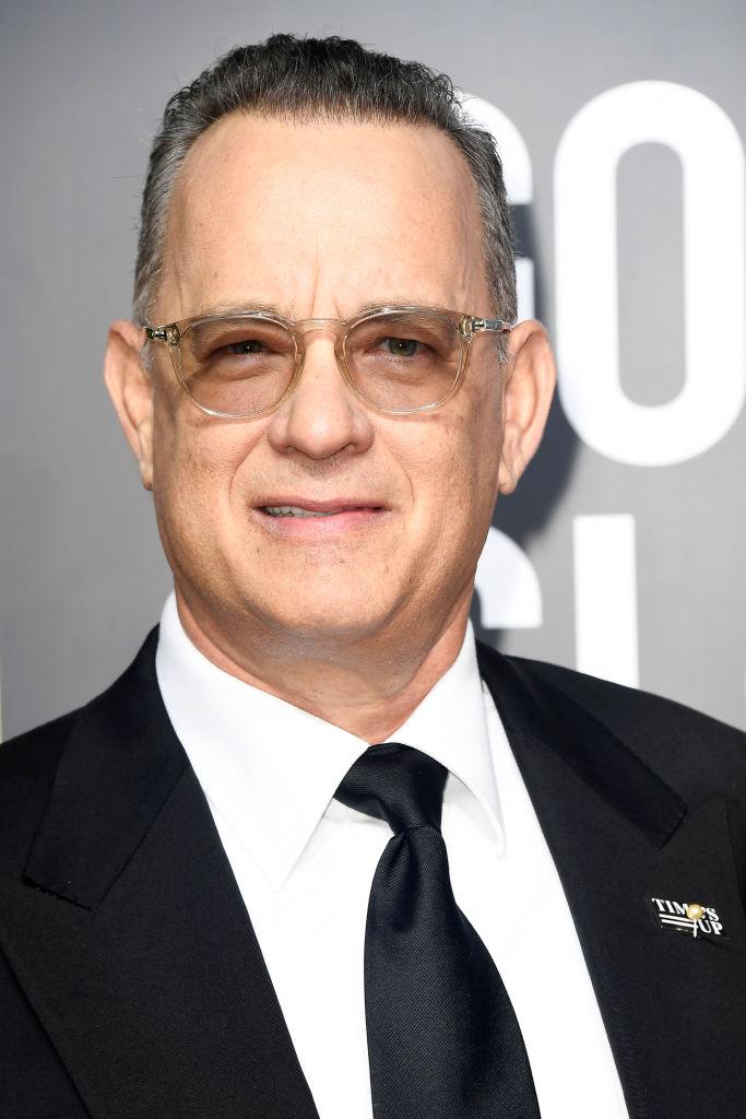 Tom Hanks at the 75th annual Golden Globe Awards in 2018 (©Getty Images | <a href="https://www.gettyimages.com/detail/news-photo/tom-hanks-attends-the-75th-annual-golden-globe-awards-at-news-photo/902349546">Frazer Harrison</a>)