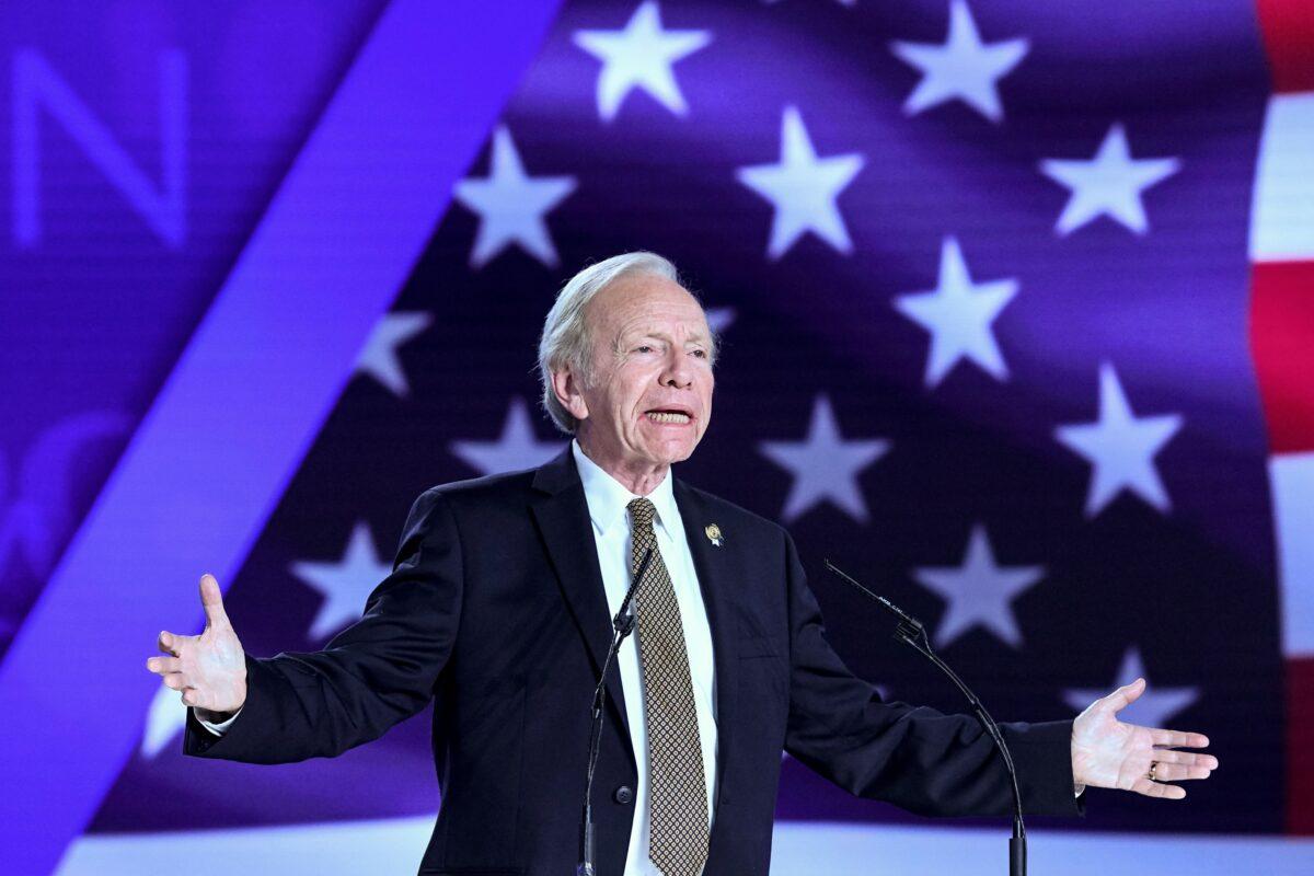Former U.S. Senator Joe Lieberman gestures as he speaks during a conference '120 Years of Struggle for Freedom Iran' at Ashraf-3 camp, which is a base for the People's Mojahedin Organization of Iran (MEK) in the Albanian town of Manza, on July 13, 2019. (Gent Shkullaku/AFP/Getty Images)