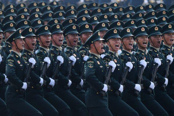 Chinese troops march during a military parade in Tiananmen Square to mark the 70th anniversary of the founding of communist China in Beijing on Oct. 1, 2019. (Greg Baker/AFP/Getty Images)