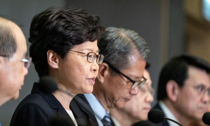 Hong Kong Leader Carrie Lam Invokes Emergency Law to Ban Masks Amid Enduring Protests