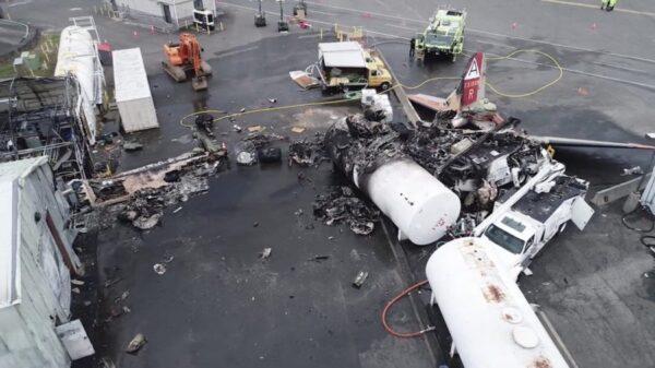 Picture shows damage from a World War II-era B-17 bomber plane that crashed on Oct. 2, 2019, at Bradley International Airport in Windsor Locks, Conn., on Oct. 3, 2019. (NTSB via AP)