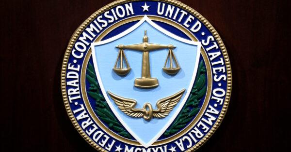  The Federal Trade Commission seal is seen at a news conference at agency headquarters in Washington, on July 24, 2019. (Yuri Gripas/Reuters)