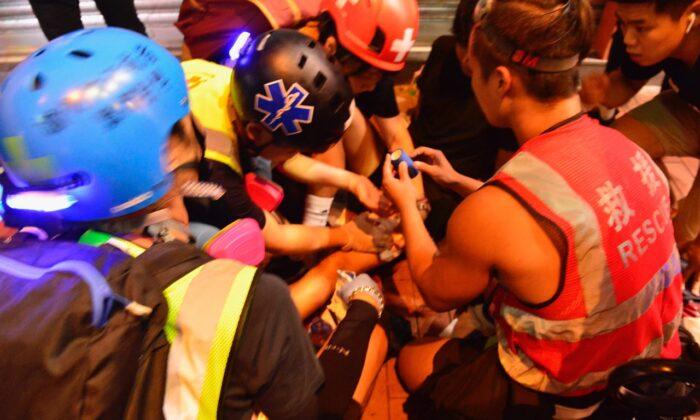14-Year-Old Shot by Plainclothes Police Officer During Hong Kong Clashes