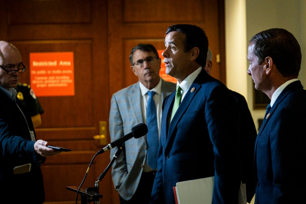 Rep. John Ratcliffe (R-Texas) speaks to the media after leaving a closed door briefing with Intelligence Community Inspector General Michael Atkinson before the House Intelligence Committee on Oct. 4, 2019. (Pete Marovich/Getty Images)