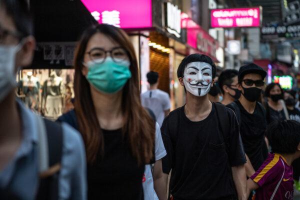People protest a ban against masks in Yau Ma Tei in Hong Kong, on Oct. 5, 2019. (Laurel Chor/Getty Images)