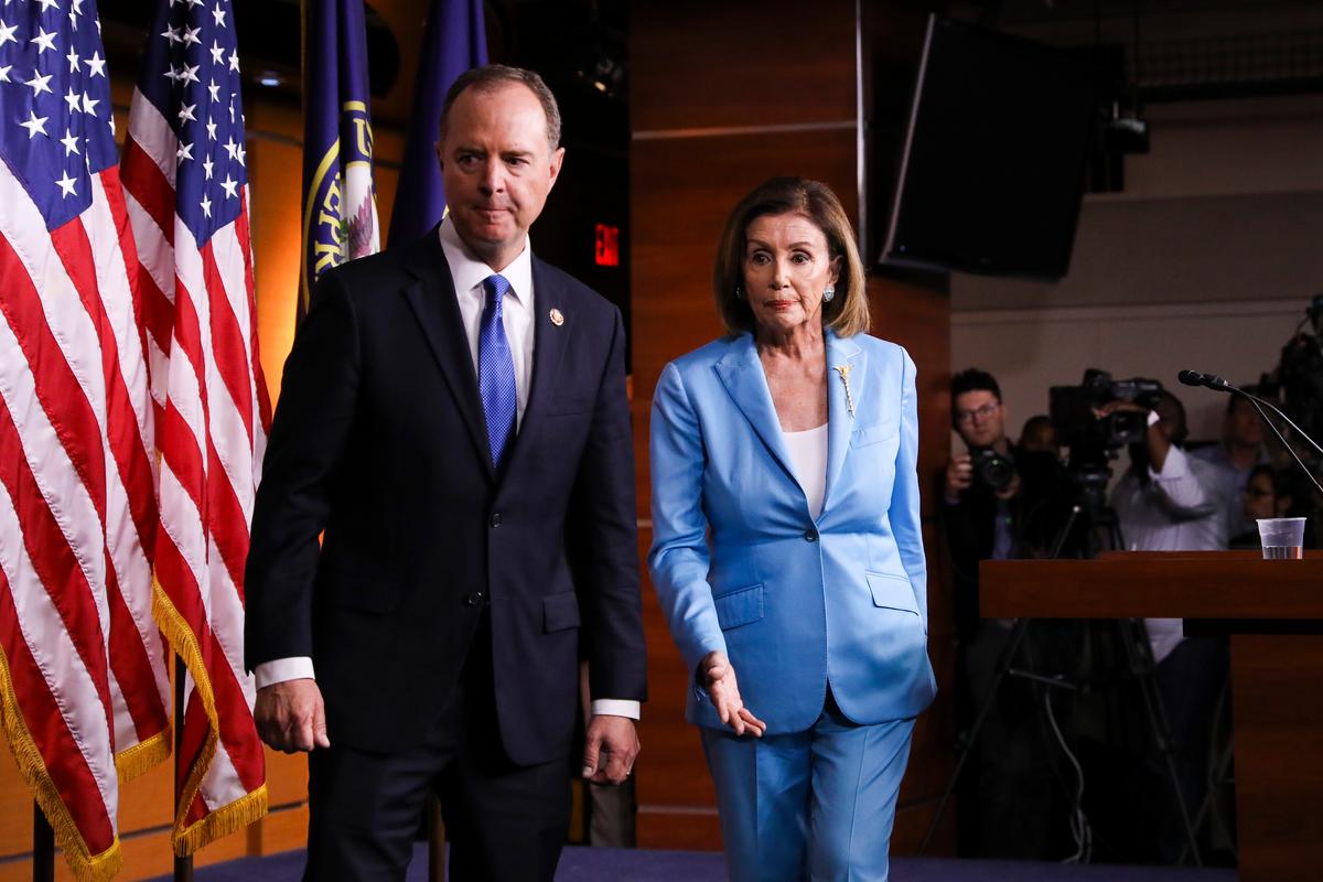 (R-L) Speaker of the House Nancy Pelosi (D-Calif.) and Rep. Adam Schiff (D-Calif.), House intelligence chairman, hold a press conference about the impeachment inquiry of President Trump, at the Capitol in Washington on Oct. 2, 2019. (Charlotte Cuthbertson/The Epoch Times)