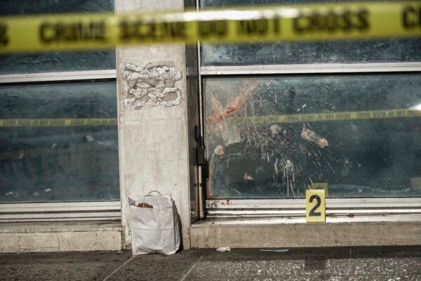 A crime scene is seen where 4 homeless men beaten in Chinatown in Manhattan, New York City on Oct 5, 2019. (Jeenah Moon/AP Photo)