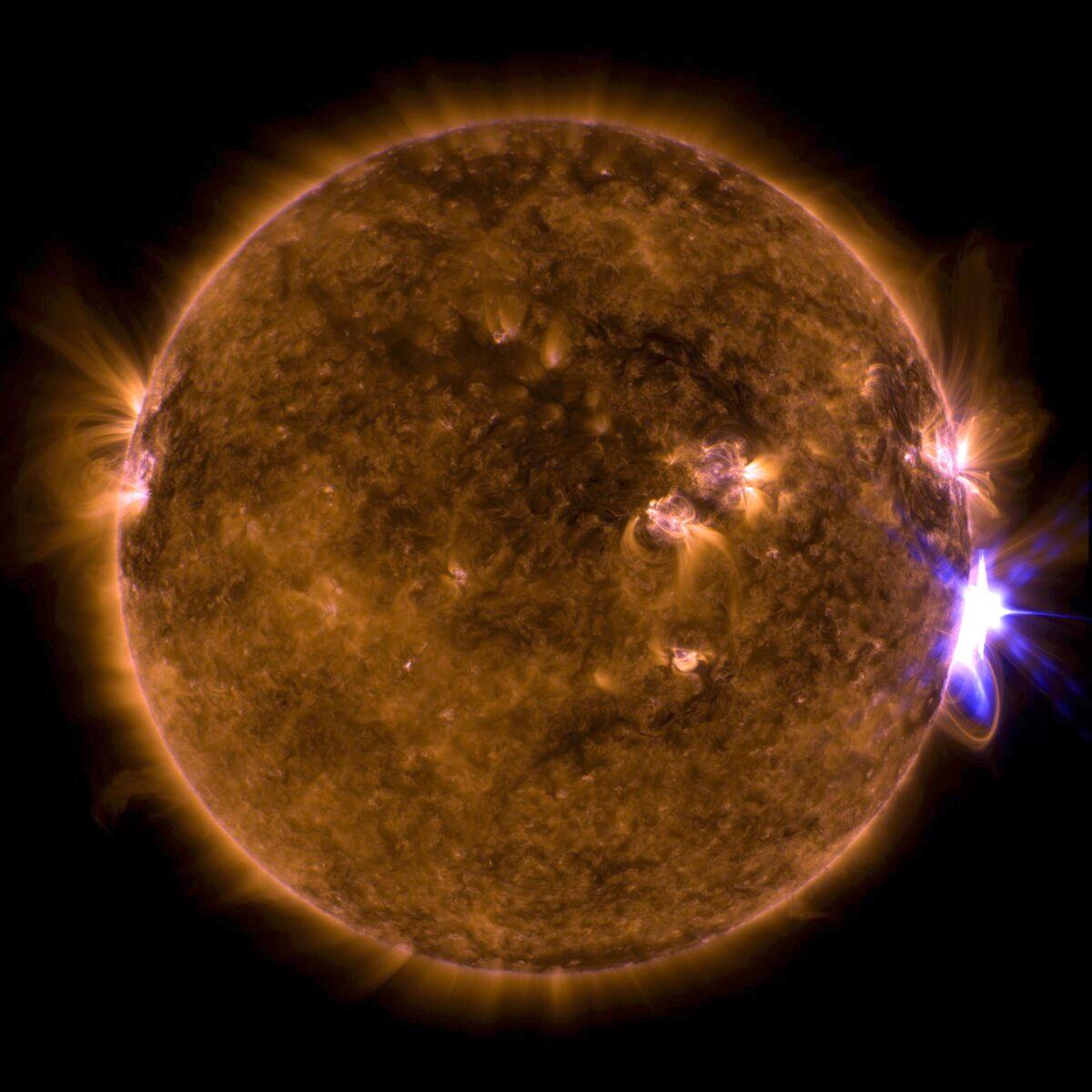 NASA’s Solar Dynamics Observatory captured this image of a solar flare, a powerful burst of radiation, as seen in the bright flash on the right side, on Sept. 10, 2017. The harmful radiation cannot pass through Earth's atmosphere to physically affect humans on the ground, but when intense enough, it can disturb the atmosphere in the layer where GPS and communications signals travel. (NASA/GSFC/Solar Dynamics Observatory)