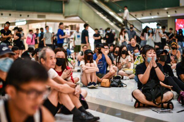 Pro-democracy protesters gather in a shopping mall in the Sha Tin district in Hong Kong on Oct. 7, 2019. (Anthony Wallace/AFP via Getty Images)