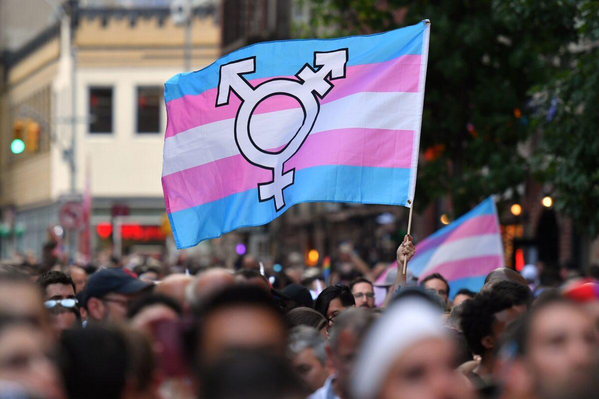  A person holds a transgender pride flag in New York on June 28, 2019. (Angela Weiss/AFP/Getty Images)