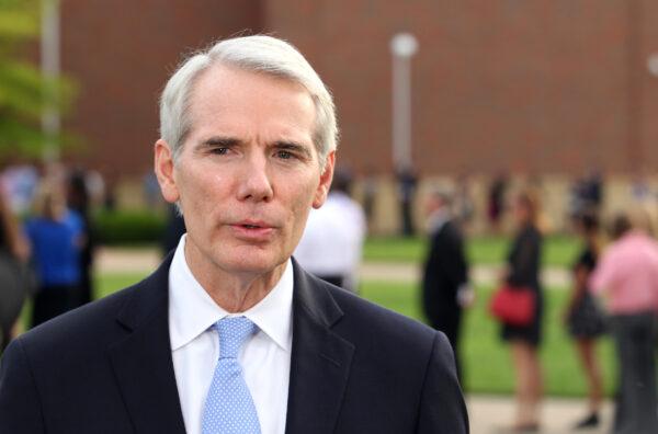 Sen. Rob Portman (R-Ohio) speaks to reporters outside Wyoming High School in Wyoming, Ohio, on June 22, 2017. (Paul Vernon/AFP/Getty Images)