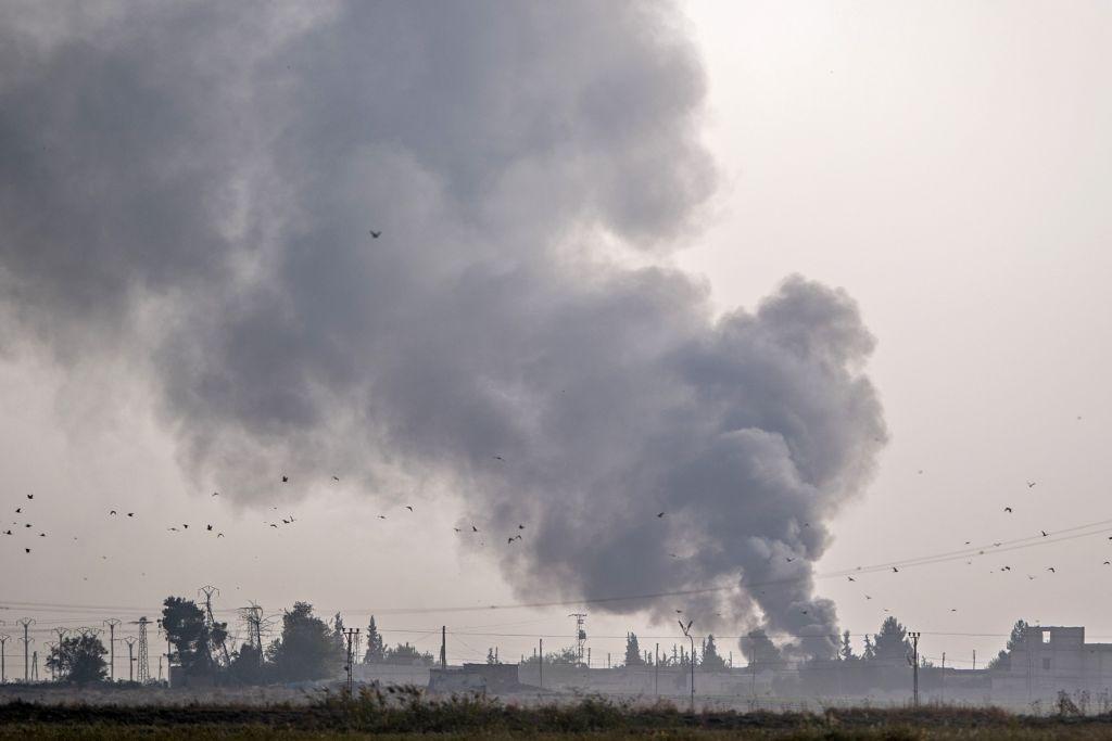 Smoke rises from the Syrian town of Tal Abyad after Turkish bombingson the border near Akcakale in the Sanliurfa province on Oct.9, 2019. Turkey launched an assault on Kurdish forces in northern Syria with air strikes and artillery fire reported along the border. (BULENT KILIC/AFP via Getty Images)