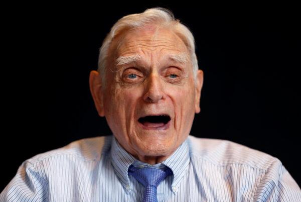 John B. Goodenough, 2019 Nobel Prize in Chemistry winner, reacts as he poses for a picture during a news conference at the Royal Society in London, Britain on Oct. 9, 2019. (Peter Nicholls/Reuters)