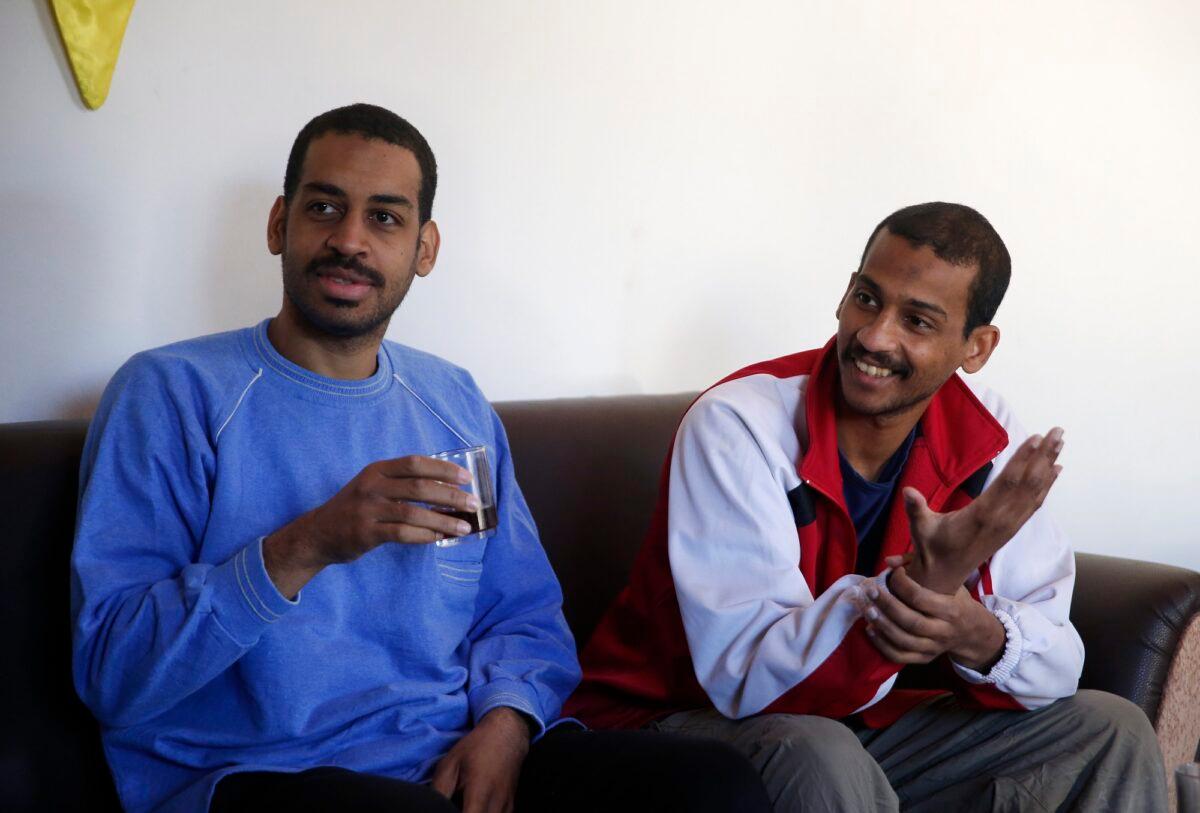 Alexanda Amon Kotey (L) and El Shafee Elsheikh, speak at a security center in Kobani, Syria, in a file photograph. (Hussein Malla, File/AP Photo)