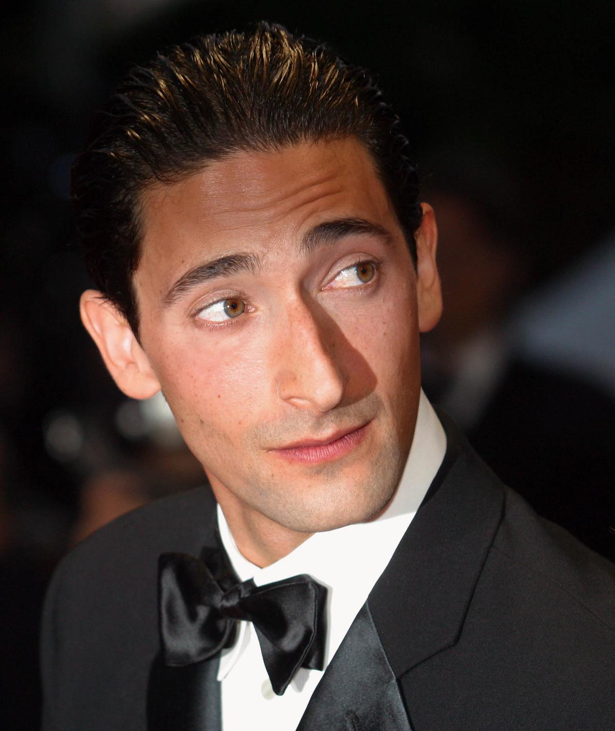 Adrien Brody, who acted the role of Wladyslaw Szpilman, arrives at the gala screening of Roman Polanski's "The Pianist" at the Cannes film festival on May 24, 2002 (Getty Images | <a href="https://www.gettyimages.com.au/detail/news-photo/actor-adrien-brody-arrives-at-the-gala-screening-of-polish-news-photo/51527286">ANNE-CHRISTINE POUJOULAT/AFP</a>)