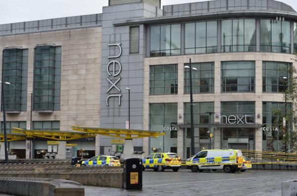 Police cars are seen outside the Arndale shopping centre after several people were stabbed in Manchester, Britain on Oct. 11, 2019. (Peter Powell/Reuters)
