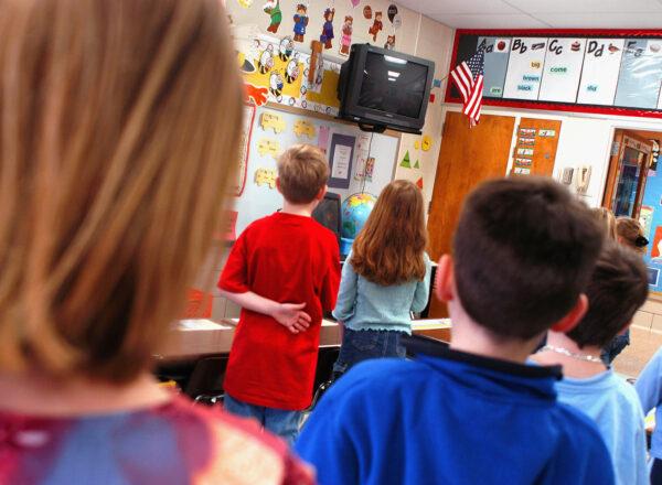 In this file image fourth graders pledge allegiance to the flag in a Pennsylvania elementary School on March 24, 2004. (William Thomas Cain/Getty Images)