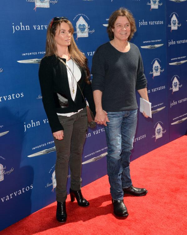 Janie Liszewski and guitarist Eddie Van Halen attend the John Varvatos 10th Annual Stuart House Benefit presented by Chrysler, Kids Tent by Hasbro Studios, in Los Angeles, California, on March 10, 2013. (Photo by Jason Merritt/Getty Images for John Varvatos)