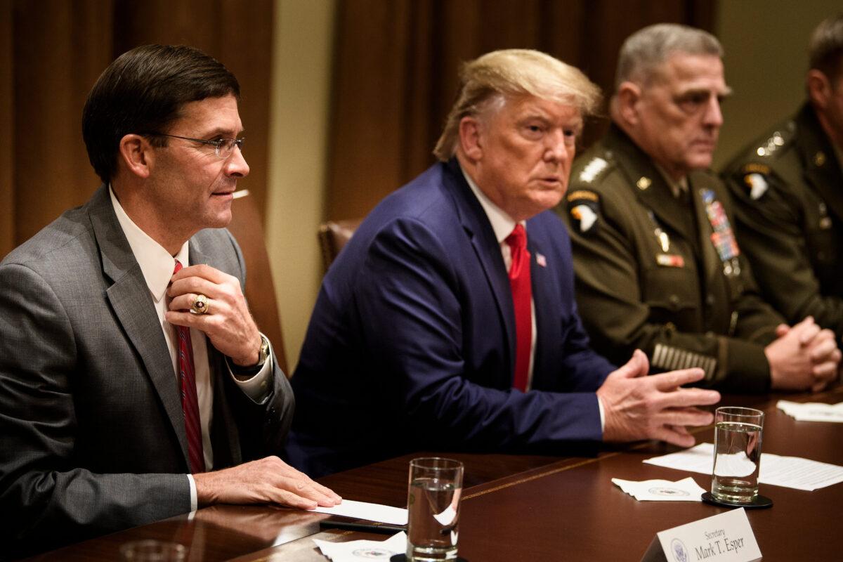 Secretary of Defense Mark Esper (L), President Donald Trump, and Chairman of the Joint Chiefs of Staff Army General Mark A. Milley (R) in the Cabinet Room of the White House in Washington on Oct. 7, 2019. (BRENDAN SMIALOWSKI/AFP via Getty Images)