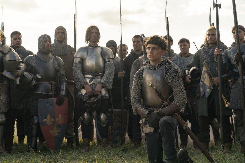 Timothée Chalamet (foreground) as King Henry V at the Battle of Agincourt, in "The King." (Netflix)
